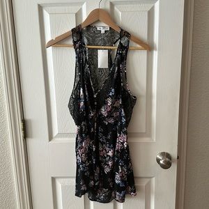 Floral sleeveless blouse in size Large